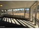 Screened sunroom/patio with view to backyard at 3613 W El Caminito Dr, Phoenix, AZ 85051