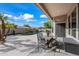 Covered patio with outdoor seating area overlooking a private pool and landscaped backyard at 4503 E Robin Ln, Phoenix, AZ 85050