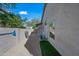 Side yard with gravel, artificial turf, and storage shed at 4503 E Robin Ln, Phoenix, AZ 85050