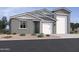 Charming single-story home with a three-car garage and a well-maintained desert landscape at 5523 W Hopi Trl, Laveen, AZ 85339