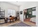 This flex room includes an office setup and an open view of the bedroom at 620 W Mclellan Blvd, Phoenix, AZ 85013