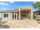 Charming backyard with a tiled patio and covered porch, perfect for outdoor entertaining at 7111 E Sienna Bouquet Pl, Scottsdale, AZ 85266