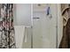 Clean bathroom featuring a shower with glass doors and neutral colored towels at 7408 E Bosaga Way, Mesa, AZ 85208