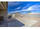 Paved patio showcases an outdoor grill and convenient access to a storage shed at 7408 E Bosaga Way, Mesa, AZ 85208