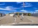 Attractive home with desert landscaping, a convenient carport, and a welcoming facade at 7408 E Bosaga Way, Mesa, AZ 85208