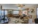 Cozy living room with comfortable seating, lots of natural light, and a warm, inviting atmosphere at 7408 E Bosaga Way, Mesa, AZ 85208