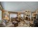 Inviting living room with cozy seating, warm lighting, and a relaxed ambiance, perfect for lounging at 7408 E Bosaga Way, Mesa, AZ 85208