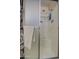 A bathroom shower with a white shower head and neutral shower curtain is perfect for cleaning up at 7408 E Bosaga Way, Mesa, AZ 85208