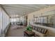 Sun room featuring natural light, plants, and cozy furniture to relax and soak up the sun at 7408 E Bosaga Way, Mesa, AZ 85208