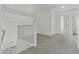 Upstairs hallway with gray carpet, white walls, and stairs leading to the lower level at 7834 W Donald Dr, Peoria, AZ 85383