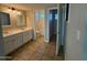 Bathroom with a double sink vanity at 8154 W Greer Ave, Peoria, AZ 85345