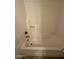 Close-up view of a bright and clean bathtub shower combination at 8154 W Greer Ave, Peoria, AZ 85345