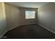 Bedroom featuring a window letting in natural light and carpet flooring at 8154 W Greer Ave, Peoria, AZ 85345