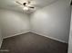 Cozy bedroom with carpet, a ceiling fan, and neutral walls at 8154 W Greer Ave, Peoria, AZ 85345