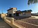 Two-story home featuring neutral siding, a fenced yard, and low-maintenance landscaping at 8154 W Greer Ave, Peoria, AZ 85345