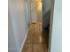 Hallway featuring tile floors, a closet and stairs at 8154 W Greer Ave, Peoria, AZ 85345