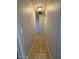 Neutral hallway with tile flooring leading to other rooms at 8154 W Greer Ave, Peoria, AZ 85345