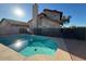 Backyard with pool, paved patio, fence and multi-story home, offering great outdoor space at 8154 W Greer Ave, Peoria, AZ 85345
