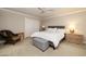 Neutral bedroom with plush carpet and a large bed with end tables at 8155 E Juan Tabo Rd, Scottsdale, AZ 85255