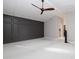 Spacious bedroom with light gray walls, white carpet and a tray ceiling at 8155 E Juan Tabo Rd, Scottsdale, AZ 85255