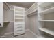 Organized closet with custom shelving and drawers at 8155 E Juan Tabo Rd, Scottsdale, AZ 85255