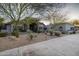 Charming home featuring stone accents, a desert landscape, and a welcoming entrance at 8155 E Juan Tabo Rd, Scottsdale, AZ 85255