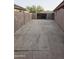 Spacious backyard featuring block walls and a concrete pad, offering privacy at 8662 W Paradise Ln, Peoria, AZ 85382