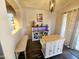 A dining area with a beverage bar, a wine rack, a hanging light, a bench, and a butcher block island at 8662 W Paradise Ln, Peoria, AZ 85382