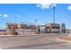 Peoria Stadium exterior showcasing the entry gate and ticket booths under a clear, blue sky at 8662 W Paradise Ln, Peoria, AZ 85382