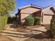 A charming one-story home with a desert landscape, walkway, and a well-maintained front yard at 8662 W Paradise Ln, Peoria, AZ 85382