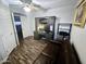 Cozy home office featuring built-in desk, ample storage, and comfortable seating area at 8662 W Paradise Ln, Peoria, AZ 85382