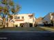 Charming home with a well-manicured lawn and mature tree in a residential neighborhood at 8819 N 12Th Pl, Phoenix, AZ 85020
