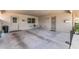 Charming carport featuring an outside sitting area, creating a welcoming space for guests or relaxing outdoors at 10801 W Mountain View Rd, Sun City, AZ 85351