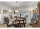 Inviting dining room with a cozy atmosphere, perfect for Gathering meals and entertaining friends at 10801 W Mountain View Rd, Sun City, AZ 85351