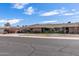 Beautifully landscaped single-story home with a well-manicured lawn and convenient carport in a desirable neighborhood at 10801 W Mountain View Rd, Sun City, AZ 85351