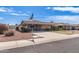 Charming single-story home featuring a well-maintained front yard and a spacious driveway, perfect for a serene neighborhood setting at 10801 W Mountain View Rd, Sun City, AZ 85351