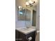 Bright bathroom vanity offering a bright mirror and lighting at 11207 N 59Th Dr, Glendale, AZ 85304