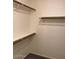 Spacious walk-in closet with built-in shelving at 11207 N 59Th Dr, Glendale, AZ 85304