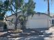 Inviting home with mature trees and landscaping, offering great curb appeal and a welcoming atmosphere at 11207 N 59Th Dr, Glendale, AZ 85304