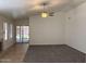 Bright living room with a fireplace, creating a warm and inviting space for gatherings and relaxation at 11207 N 59Th Dr, Glendale, AZ 85304