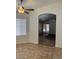 Bright living room with tile floors and a large entryway to the patio at 11207 N 59Th Dr, Glendale, AZ 85304