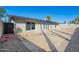 Backyard with gravel and concrete patio at 12235 N 36Th Dr, Phoenix, AZ 85029