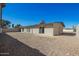 Spacious backyard with a gravel ground covering at 12235 N 36Th Dr, Phoenix, AZ 85029