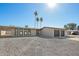 Beautiful home showcasing low-maintenance landscaping, a two-car garage, and a clean, modern design at 12235 N 36Th Dr, Phoenix, AZ 85029