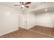 Bright bedroom featuring a ceiling fan and wood-look floors at 1919 E Libby St, Phoenix, AZ 85022