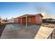 A charming home featuring an open carport and a well-maintained exterior in a residential neighborhood at 1919 E Libby St, Phoenix, AZ 85022