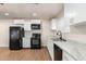 Bright kitchen featuring stainless steel appliances and ample cabinet space at 1919 E Libby St, Phoenix, AZ 85022