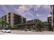 Exterior view of modern apartment buildings with covered parking and landscaping at 19355 N 73Rd Way # 4016, Scottsdale, AZ 85255