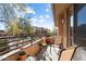 Cozy balcony with seating, outdoor decor, and view of the surrounding community at 19777 N 76Th St # 1272, Scottsdale, AZ 85255