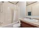 Clean bathroom featuring a shower, a vanity with sink, and neutral decor at 201 S Greenfield Rd # 254, Mesa, AZ 85206